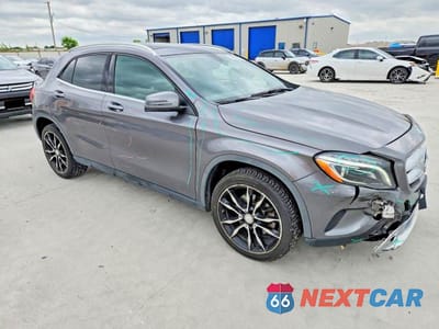 Czwarte zdjęcie samochodu z boku: 2015 MERCEDES-BENZ GLA 250 4MATIC VIN:WDCTG4GB2FJ030718 - miniatura