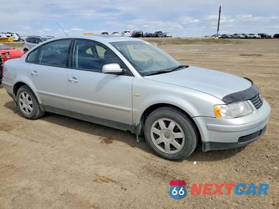 Czwarte zdjęcie samochodu z boku: 1999 VOLKSWAGEN PASSAT GLS VIN:WVWAD63B5XE321862 - miniatura