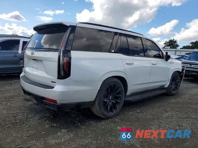 Trzecie zdjęcie samochodu z tyłu: 2023 CADILLAC ESCALADE SPORT PLATINUM VIN:1GYS4GKL7PR556996 - miniatura