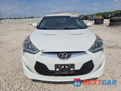 Piąte zdjęcie samochodu w środku: 2013 HYUNDAI VELOSTER RE MIX VIN:KMHTC6AD4DU134075 - miniatura