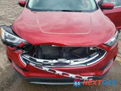 Zdjęcie 12 z 13 samochodu: 2021 FORD EDGE SEL VIN:2FMPK4J99MBA34631 - miniatura