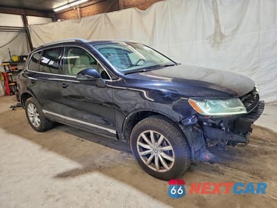 Czwarte zdjęcie samochodu z boku: 2016 VOLKSWAGEN TOUAREG SPORT VIN:WVGEF9BPXGD002419 - miniatura