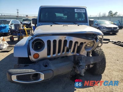 Piąte zdjęcie samochodu w środku: 2013 JEEP WRANGLER UNLIMITED SAHARA VIN:1C4BJWEG5DL617770 - miniatura