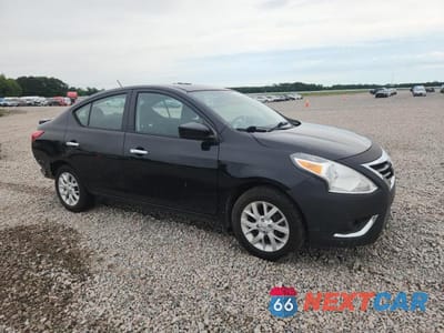 Czwarte zdjęcie samochodu z boku: 2017 NISSAN VERSA 1.6 S VIN:3N1CN7AP0HL818588 - miniatura