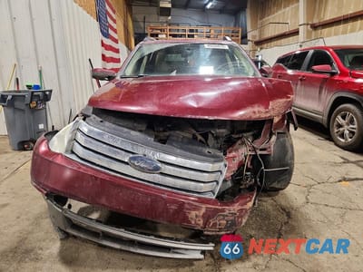 Piąte zdjęcie samochodu w środku: 2008 FORD TAURUS X SEL VIN:1FMDK02W48GA39122 - miniatura