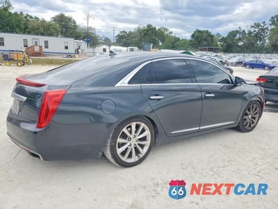 Trzecie zdjęcie samochodu z tyłu: 2013 CADILLAC XTS PREMIUM COLLECTION VIN:2G61T5S32D9176577 - miniatura