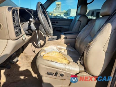 Zdjęcie 7 z 13 samochodu: 2003 GMC YUKON XL C1500 VIN:1GKEC16Z13J178138 - miniatura
