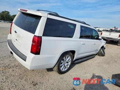 Trzecie zdjęcie samochodu z tyłu: 2019 CHEVROLET SUBURBAN K1500 LT VIN:1GNSKHKCXKR148090 - miniatura
