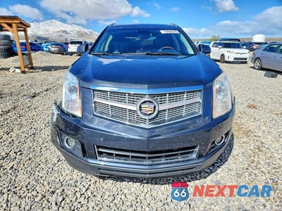 Piąte zdjęcie samochodu w środku: 2010 CADILLAC SRX PREMIUM COLLECTION VIN:3GYFNKE45AS589750 - miniatura
