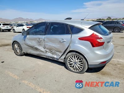 Drugie zdjęcie samochodu z przodu: 2014 FORD FOCUS TITANIUM VIN:1FADP3N26EL299837 - miniatura