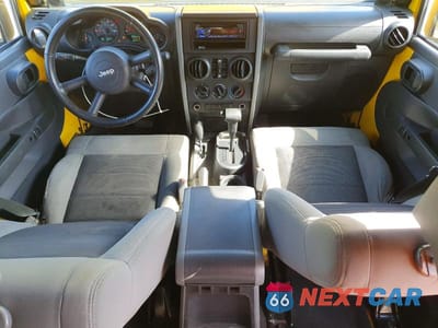 Zdjęcie 8 z 13 samochodu: 2009 JEEP WRANGLER UNLIMITED X VIN:1J4GA39169L700197 - miniatura