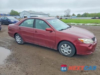 Czwarte zdjęcie samochodu z boku: 2003 TOYOTA CAMRY LE VIN:4T1BE32K13U252665 - miniatura