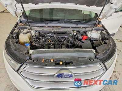 Zdjęcie 12 z 13 samochodu: 2016 FORD EDGE SEL VIN:2FMPK4J94GBC37110 - miniatura