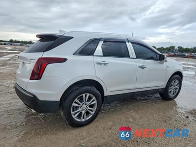 Trzecie zdjęcie samochodu z tyłu: 2022 CADILLAC XT5 LUXURY VIN:1GYKNAR49NZ164642 - miniatura