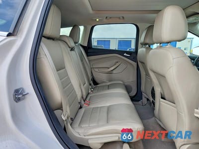 Zdjęcie 11 z 13 samochodu: 2016 FORD ESCAPE TITANIUM VIN:1FMCU0J93GUC78341 - miniatura