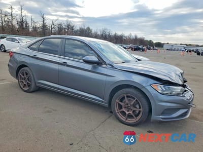 Czwarte zdjęcie samochodu z boku: 2019 VOLKSWAGEN JETTA S VIN:3VWC57BU4KM260146 - miniatura