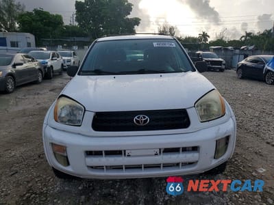 Piąte zdjęcie samochodu w środku: 2002 TOYOTA RAV4 BASE VIN:JTEGH20VX20063569 - miniatura