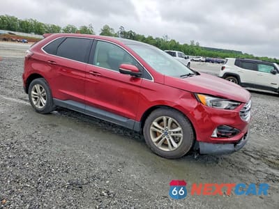 Czwarte zdjęcie samochodu z boku: 2019 FORD EDGE VIN:2FMPK4J92KBC61026 - miniatura