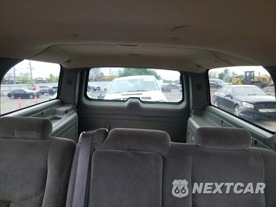 Zdjęcie 10 z 13 samochodu: 2003 CHEVROLET SUBURBAN C1500 VIN:1GNEC16Z83J166846 - miniatura