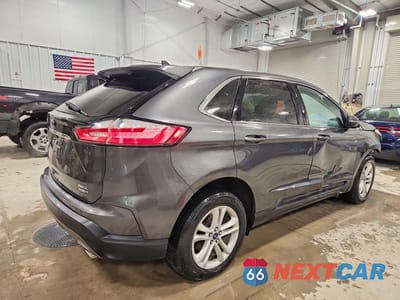 Trzecie zdjęcie samochodu z tyłu: 2020 FORD EDGE SEL VIN:2FMPK4J96LBB42896 - miniatura
