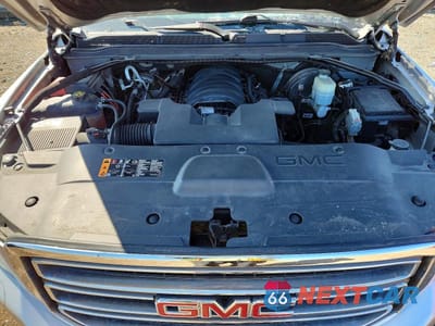 Zdjęcie 12 z 13 samochodu: 2020 GMC YUKON XL K1500 SLT VIN:1GKS2GKC7LR154843 - miniatura