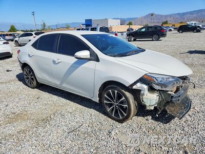 Czwarte zdjęcie samochodu z boku: 2018 TOYOTA COROLLA L VIN:5YFBURHE6JP816400 - miniatura
