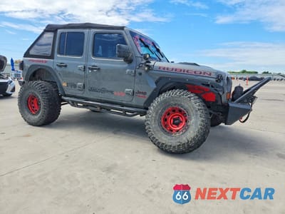 Czwarte zdjęcie samochodu z boku: 2021 JEEP WRANGLER UNLIMITED RUBICON VIN:1C4JJXFM4MW617439 - miniatura