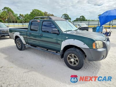 Czwarte zdjęcie samochodu z boku: 2002 NISSAN FRONTIER XE-V6 VIN:1N6ED29X22C317234 - miniatura