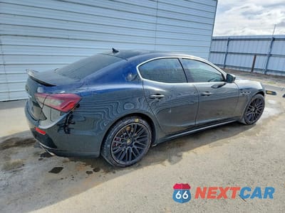 Trzecie zdjęcie samochodu z tyłu: 2016 MASERATI GHIBLI S VIN:ZAM57RSA2G1189200 - miniatura