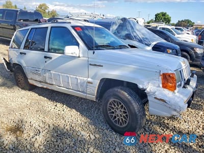 Czwarte zdjęcie samochodu z boku: 1995 JEEP GRAND CHEROKEE LIMITED VIN:1J4GZ78Y1SC640138 - miniatura