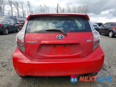 Zdjęcie 6 z 13 samochodu: 2013 TOYOTA PRIUS C TWO VIN:JTDKDTB36D1535436 - miniatura