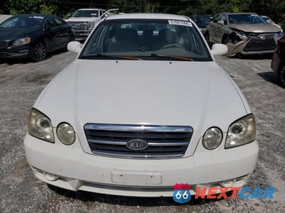 Piąte zdjęcie samochodu w środku: 2005 KIA OPTIMA LX VIN:KNAGD126455400595 - miniatura
