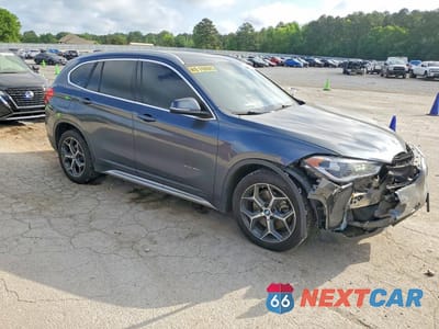 Czwarte zdjęcie samochodu z boku: 2017 BMW X1 SDRIVE28I VIN:WBXHU7C39H5H35280 - miniatura