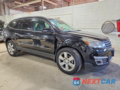 Czwarte zdjęcie samochodu z boku: 2017 CHEVROLET TRAVERSE PREMIER VIN:1GNKVJKD3HJ137656 - miniatura