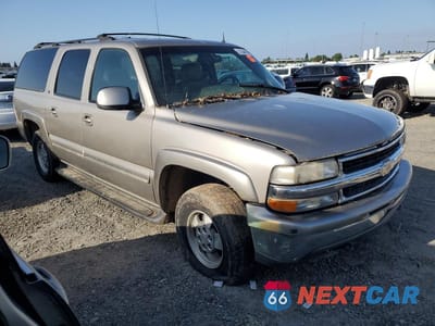 Czwarte zdjęcie samochodu z boku: 2002 CHEVROLET SUBURBAN K1500 VIN:1GNFK16T12J211370 - miniatura