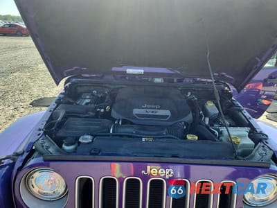 Zdjęcie 12 z 13 samochodu: 2018 JEEP WRANGLER UNLIMITED SAHARA VIN:1C4BJWEG7JL816833 - miniatura