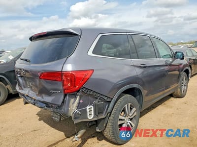 Trzecie zdjęcie samochodu z tyłu: 2018 HONDA PILOT EXLN VIN:5FNYF6H74JB005713 - miniatura