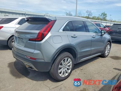 Trzecie zdjęcie samochodu z tyłu: 2023 CADILLAC XT4 PREMIUM LUXURY VIN:1GYFZDR40PF176643 - miniatura