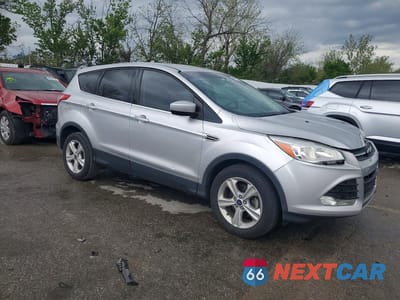 Czwarte zdjęcie samochodu z boku: 2016 FORD ESCAPE SE VIN:1FMCU0G74GUA34364 - miniatura
