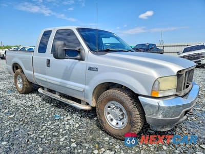 Czwarte zdjęcie samochodu z boku: 2002 FORD F250 SUPER DUTY VIN:1FTNX20F62EA21989 - miniatura