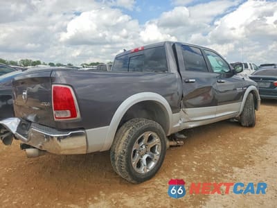 Trzecie zdjęcie samochodu z tyłu: 2015 RAM 1500 LARAMIE VIN:1C6RR7NT1FS733994 - miniatura