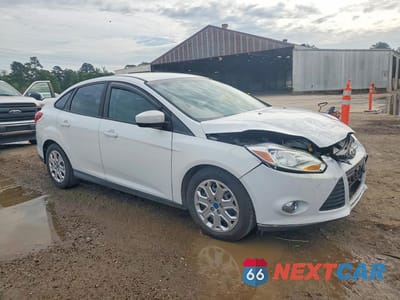 Czwarte zdjęcie samochodu z boku: 2012 FORD FOCUS SE VIN:1FAHP3F2XCL352665 - miniatura