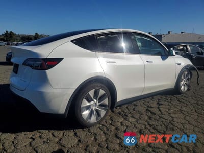 Trzecie zdjęcie samochodu z tyłu: 2022 TESLA MODEL Y VIN:7SAYGDEE9NF427747 - miniatura