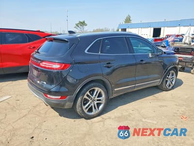 Trzecie zdjęcie samochodu z tyłu: 2015 LINCOLN MKC VIN:5LMCJ2A9XFUJ47388 - miniatura