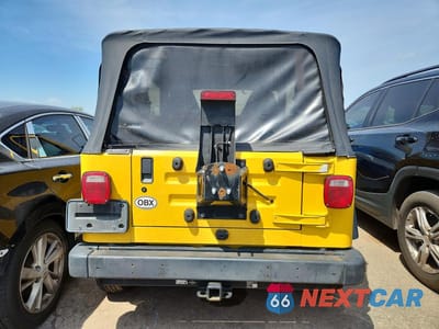 Zdjęcie 6 z 13 samochodu: 2000 JEEP WRANGLER / TJ SPORT VIN:1J4FA49S3YP749004 - miniatura