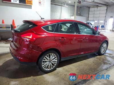 Trzecie zdjęcie samochodu z tyłu: 2017 FORD FOCUS TITANIUM VIN:1FADP3N26HL346420 - miniatura