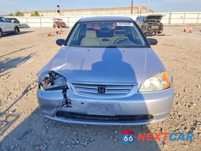 Piąte zdjęcie samochodu w środku: 2001 HONDA CIVIC LX VIN:1HGES16581L058304 - miniatura