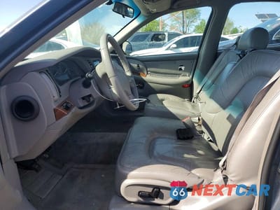 Zdjęcie 7 z 12 samochodu: 2002 BUICK PARK AVENUE VIN:1G4CW54K724148173 - miniatura