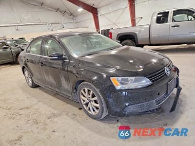Czwarte zdjęcie samochodu z boku: 2014 VOLKSWAGEN JETTA SE VIN:3VWD17AJ9EM419934 - miniatura
