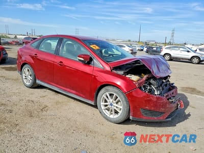 Czwarte zdjęcie samochodu z boku: 2017 FORD FOCUS SE VIN:1FADP3F22HL214611 - miniatura